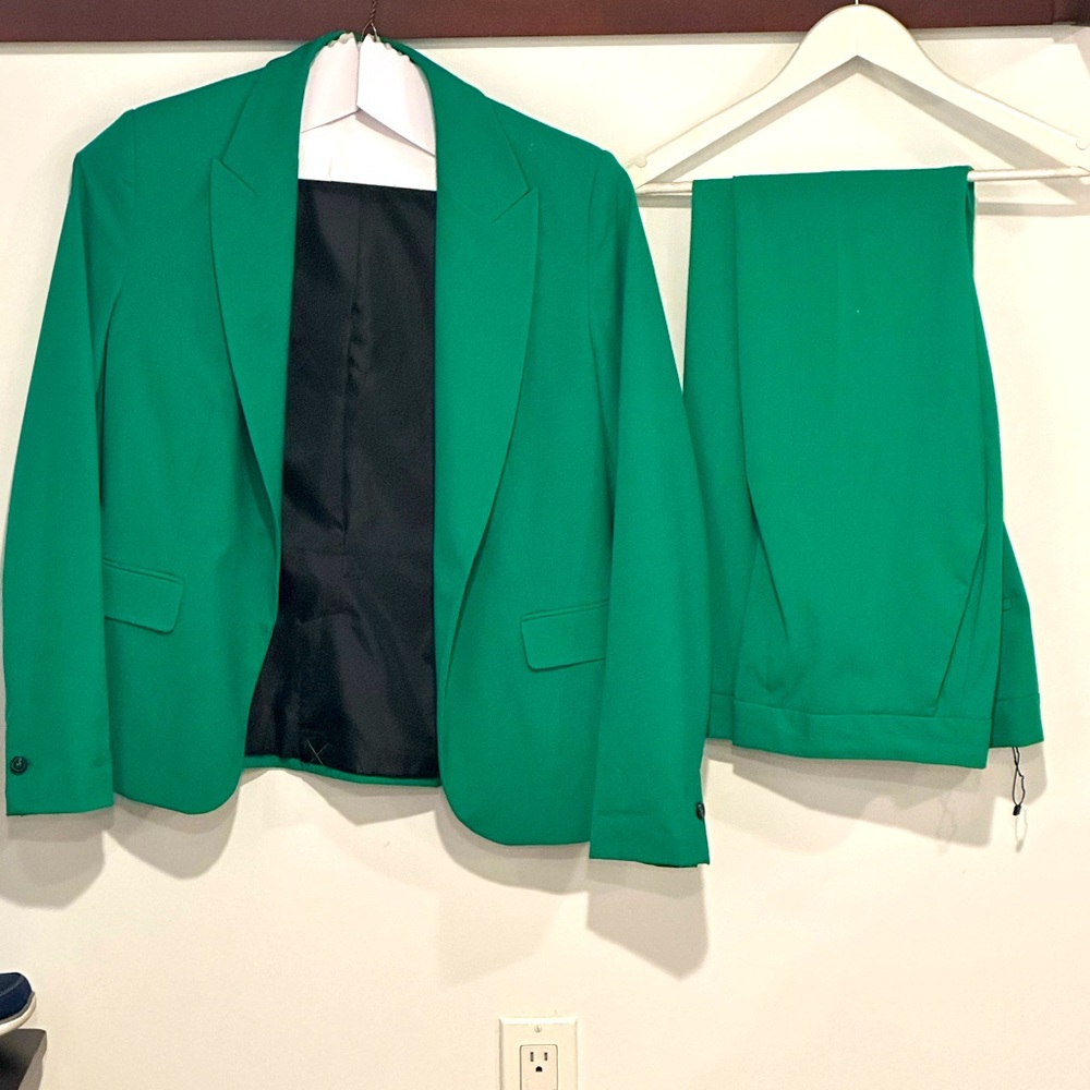 Emerald green suit. Only wore once.